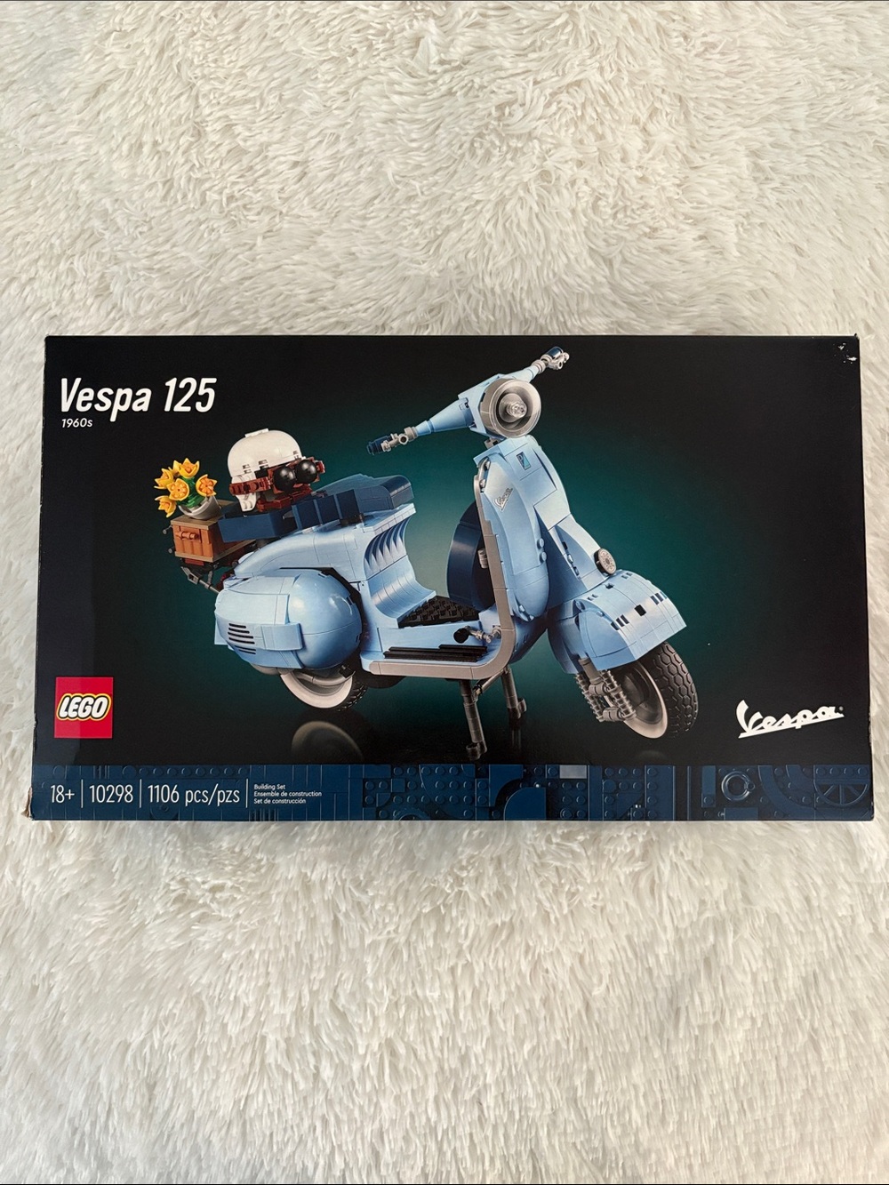 Lego Vespa 125 Light Blue Scooter Model with White Helmet and Brown Crate